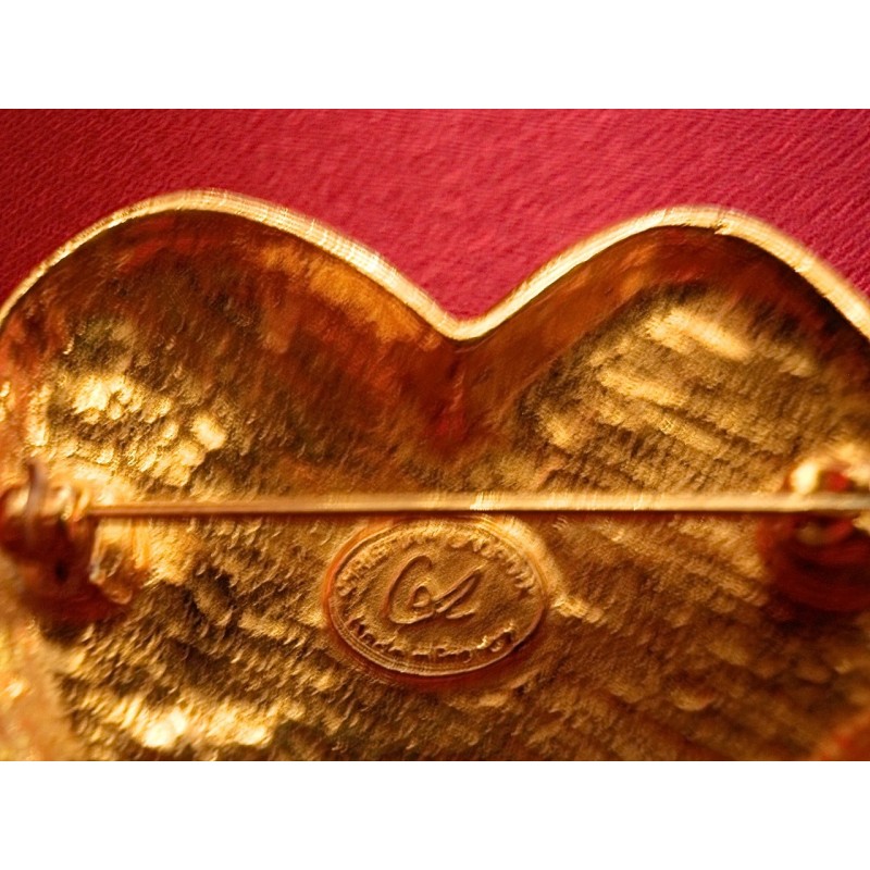 Broche Christian Lacroix "Signature CL"